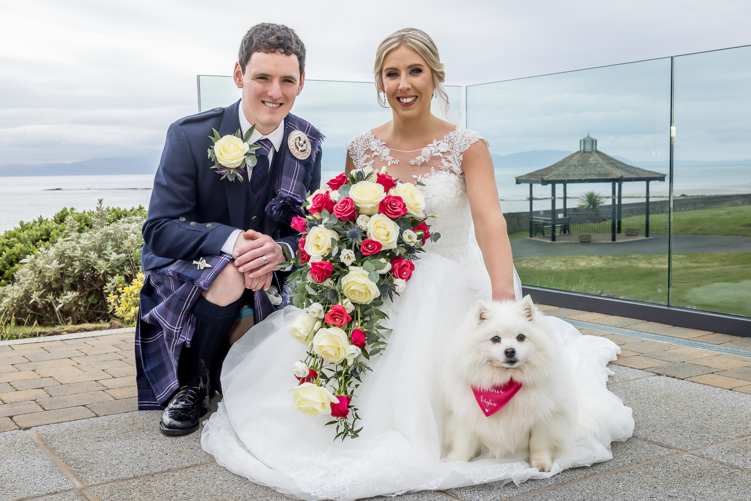 Seamill Hydro Wedding Photographer with bride and groom overlooking the Ayrshire coast