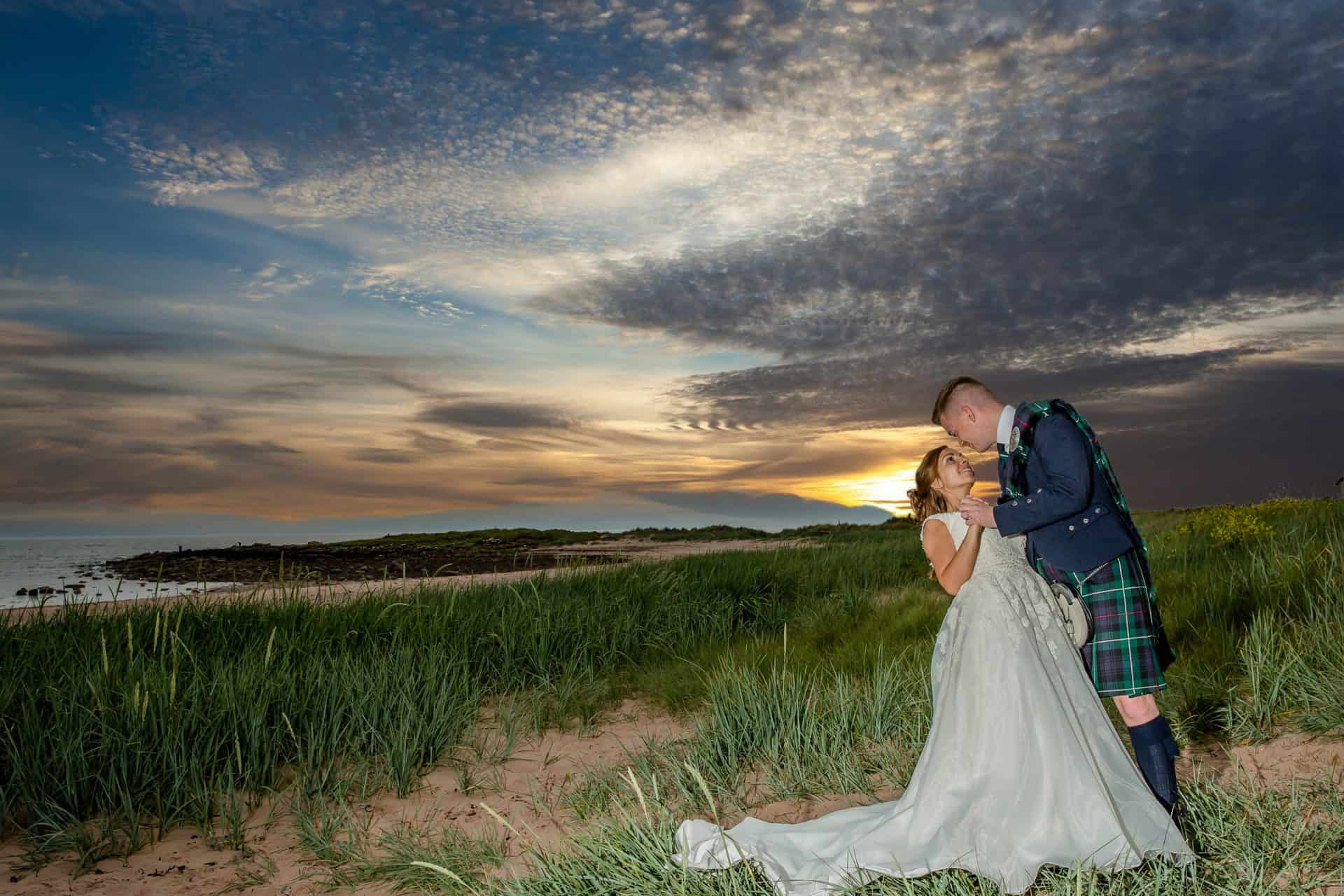 Waterside Wedding Photographer – bride and groom at sunset at The Waterside Hotel & Spa, West Kilbride